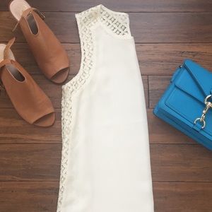 Sleeveless White Blouse
